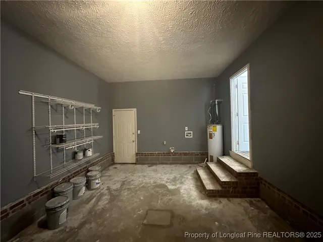 a bathroom with a toilet and a sink