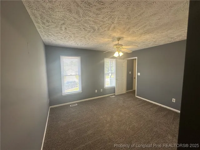 a bathroom with a sink a mirror and a toilet