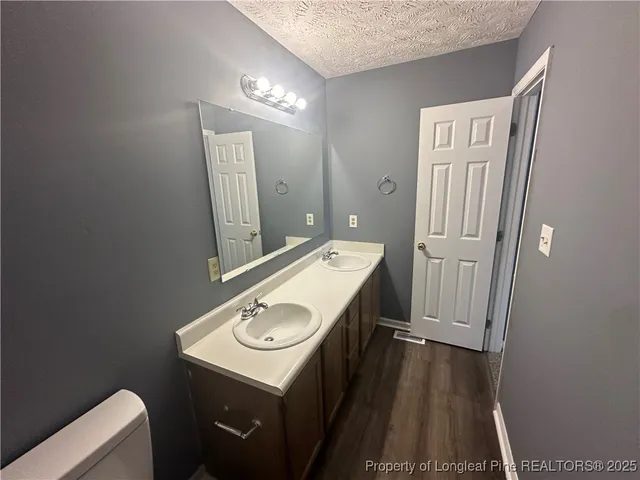 an empty room with a empty space and windows