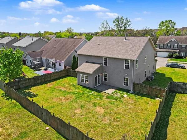 a view of a house with a big yard
