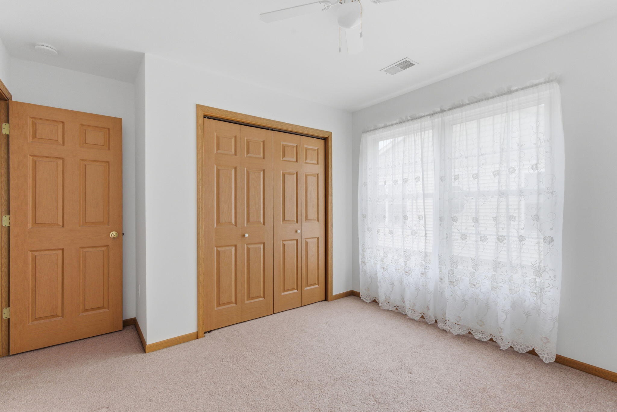 829 Johnson Street, Unit A Porter, IN 46304 - Photo 16 of 21 a view of an empty room with a window