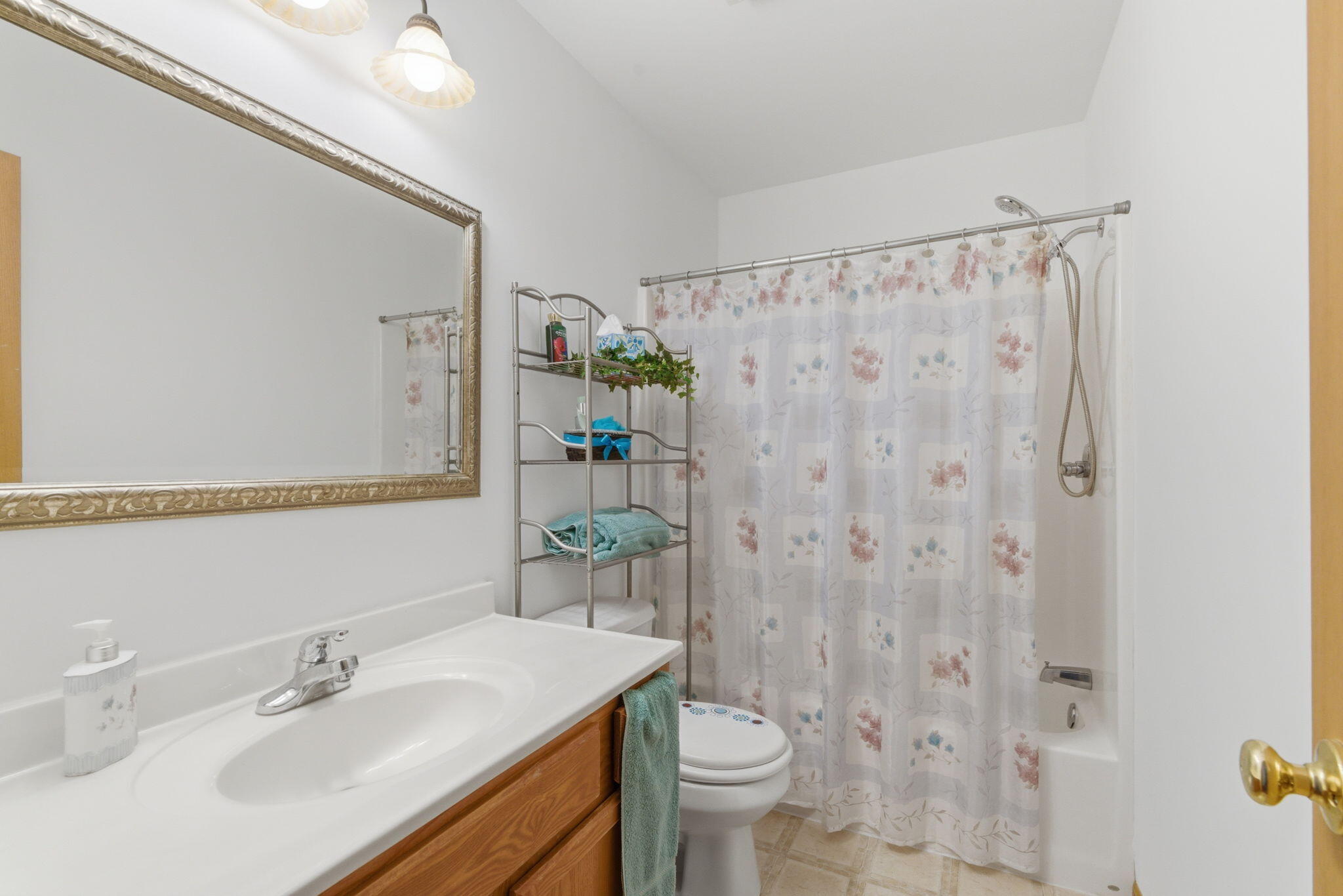 829 Johnson Street, Unit A Porter, IN 46304 - Photo 18 of 21 a bathroom with a sink toilet and shower