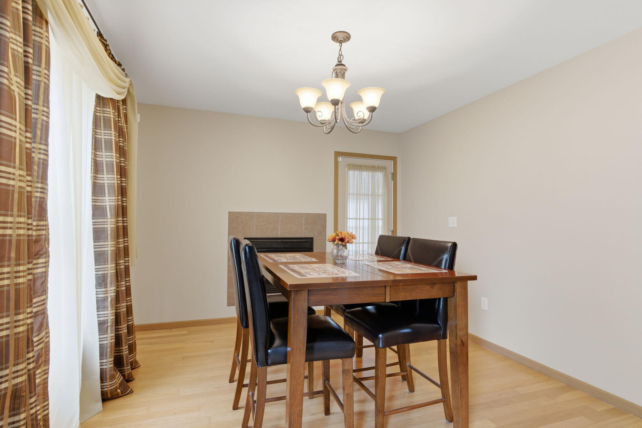 829 Johnson Street, Unit A Porter, IN 46304 - Photo 7 of 21 a view of a dining room with a table and chairs