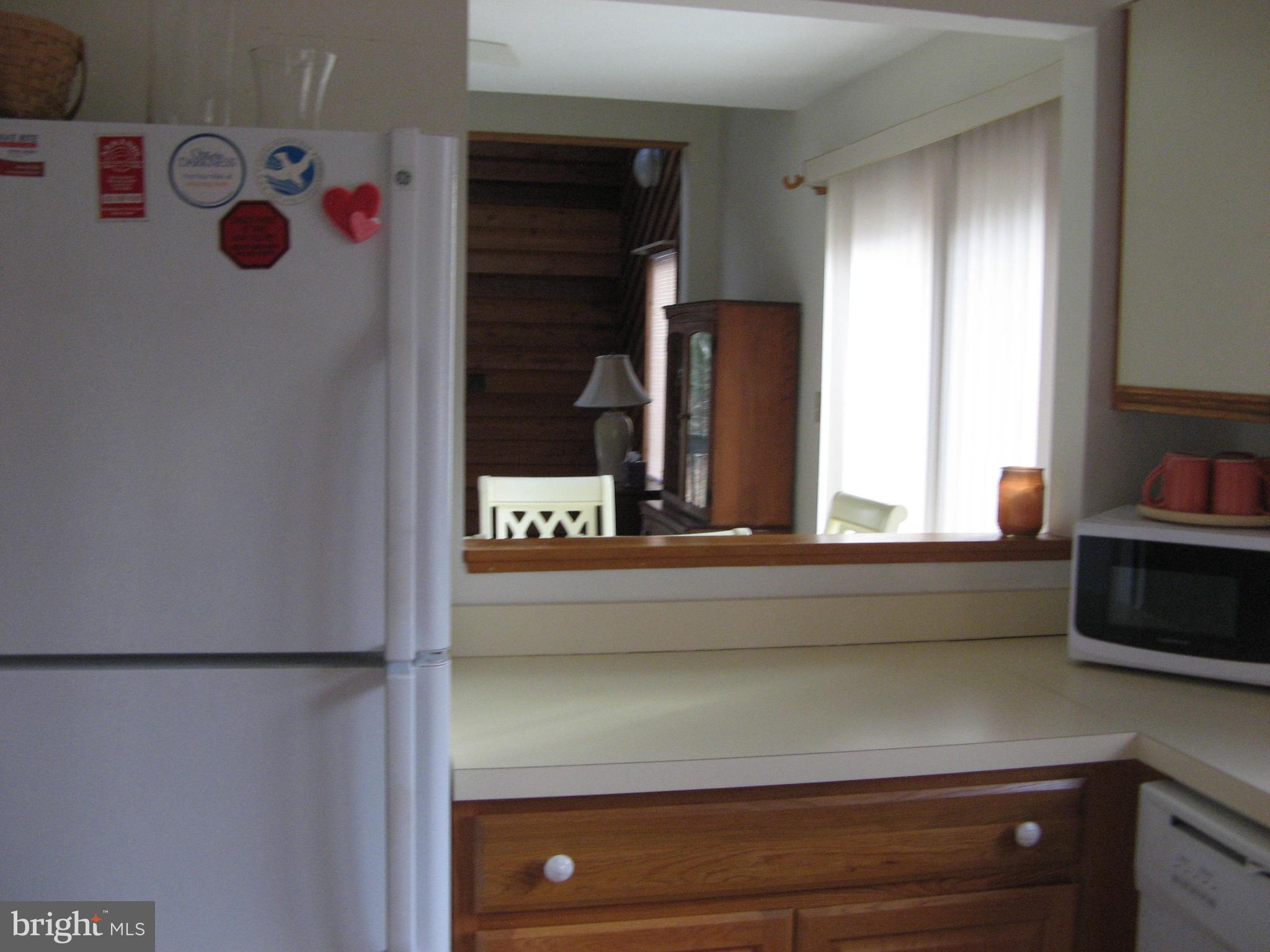 32818 Venta Drive Ocean View, DE 19970 - Photo 12 of 25 Open Counter to Dining Area