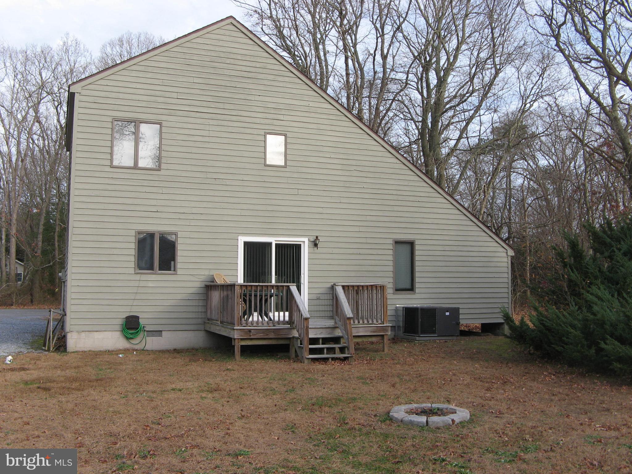 32818 Venta Drive Ocean View, DE 19970 - Photo 5 of 25 Back with firepit