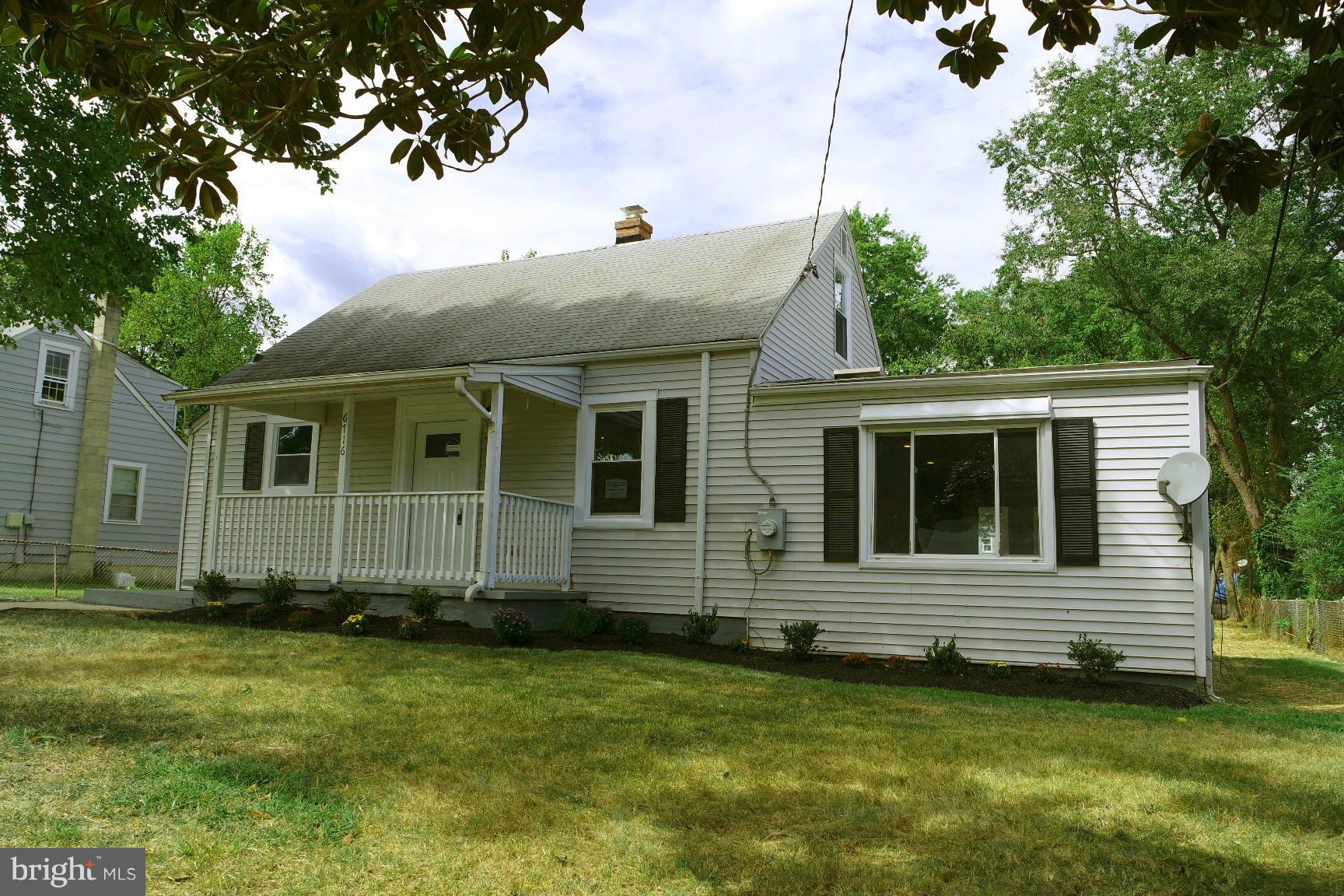 6716 Larkspur Road Morningside, MD 20746 - Photo 1 of 23 a view of a house with a yard
