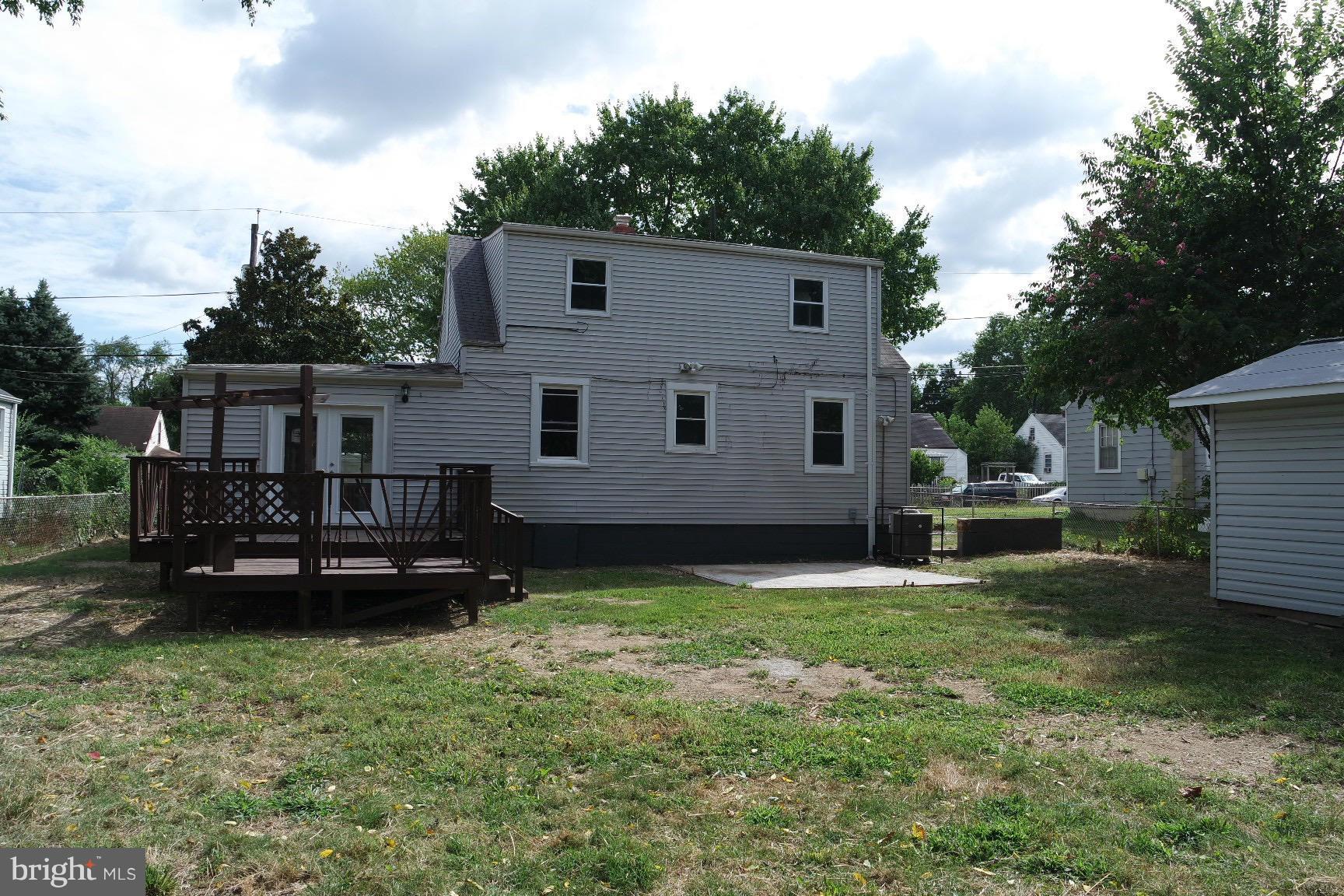 6716 Larkspur Road Morningside, MD 20746 - Photo 21 of 23 a view of a house with a backyard