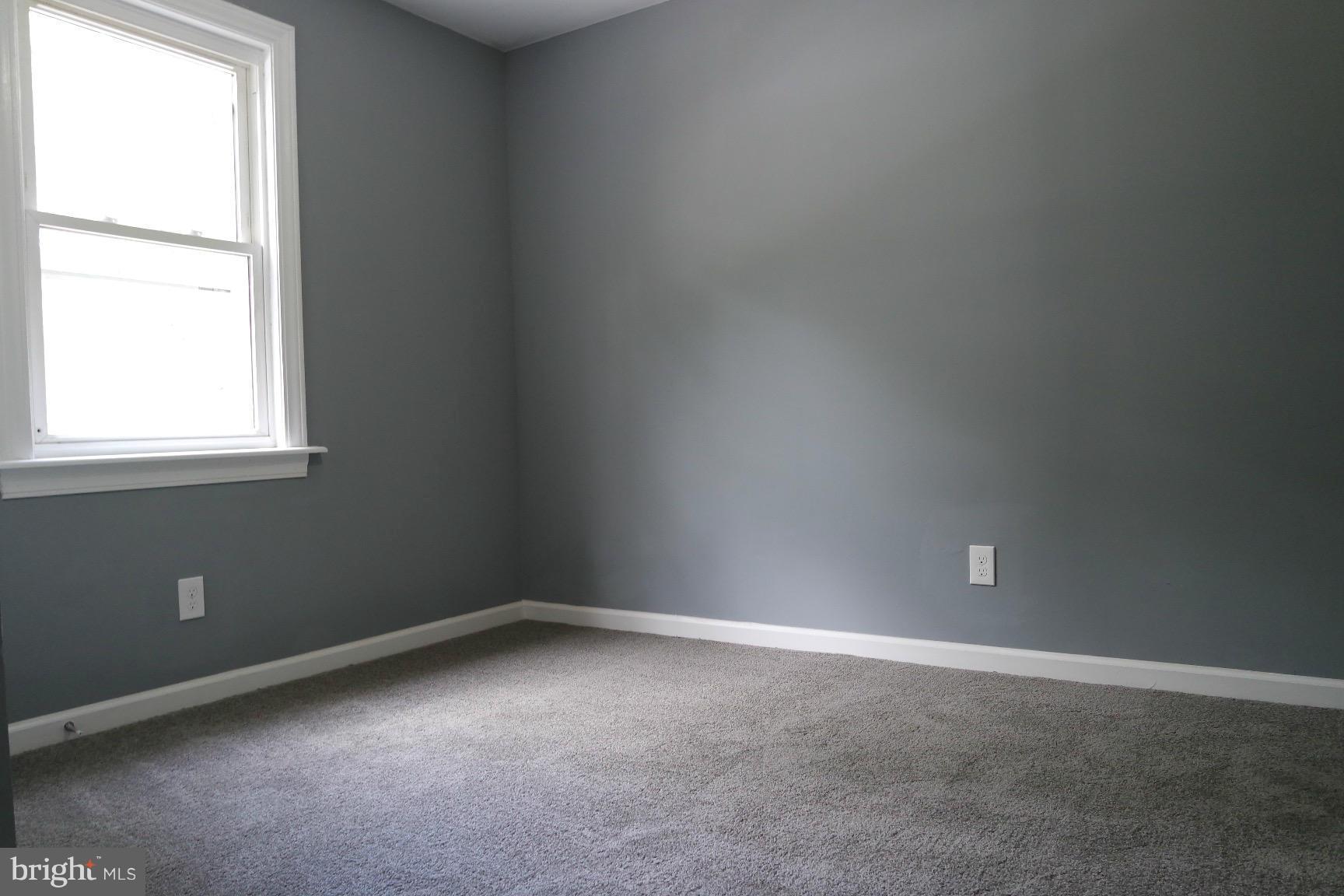 6716 Larkspur Road Morningside, MD 20746 - Photo 9 of 23 an empty room with a window