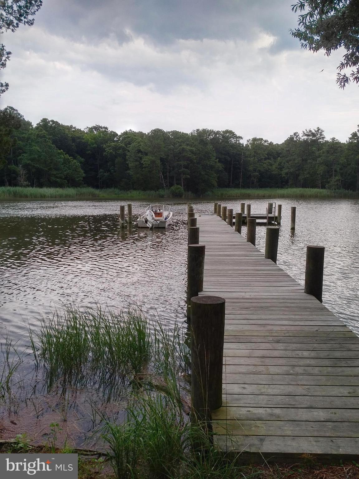 24445 Walnut Point Road Chestertown, MD 21620 - Photo 11 of 27 Dock includes slips for friends.