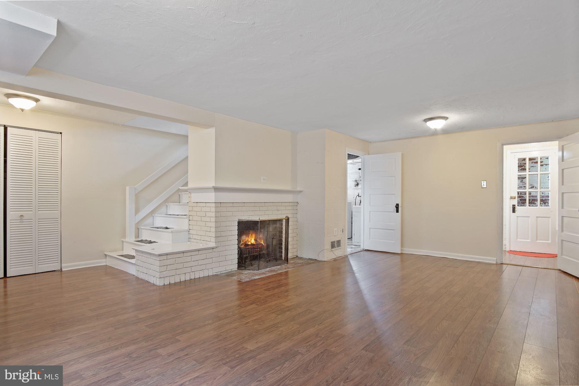 7807 Marion Lane Bethesda, MD 20814 - Photo 25 of 35 Lower level - great room with FP