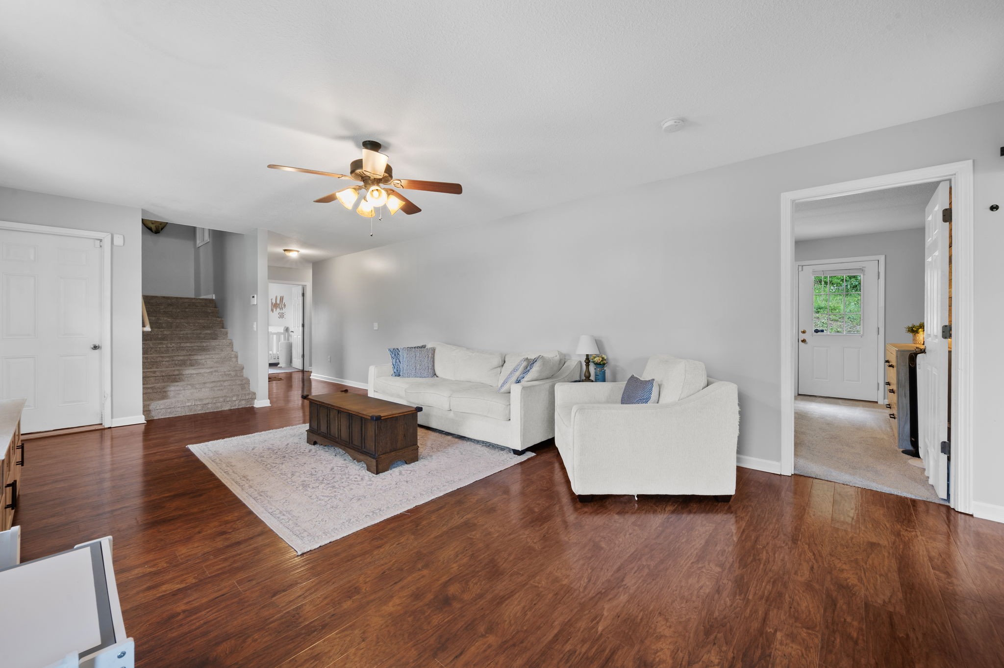 1197 Biter Road Cunningham, TN 37052 - Photo 13 of 38 a living room with furniture and wooden floor