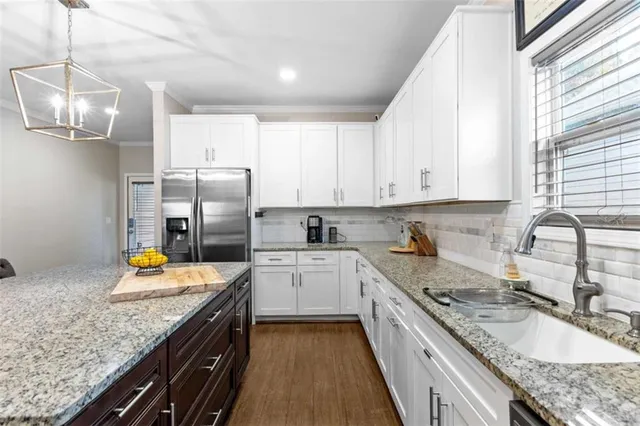 a view of livingroom with hardwood floor and closet