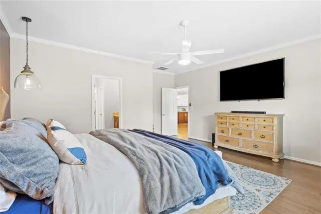 a bathroom with a toilet a sink and a mirror