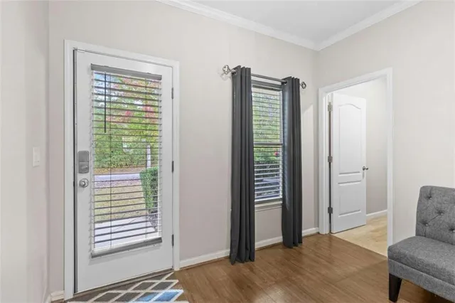 a bedroom with a bed and a chair