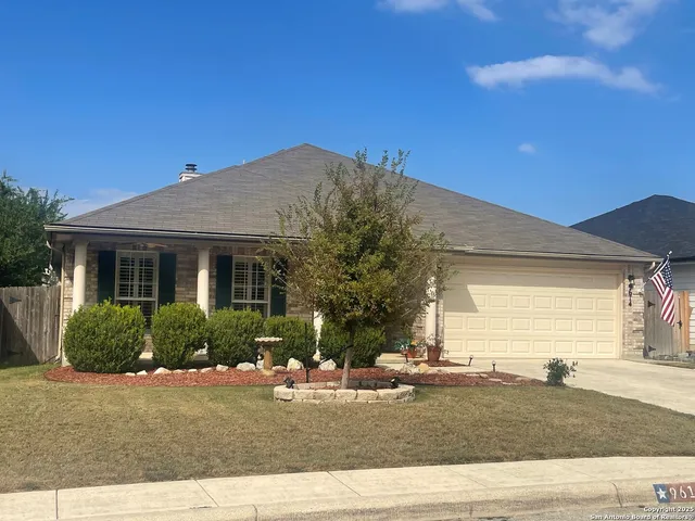 a house view with a garden space