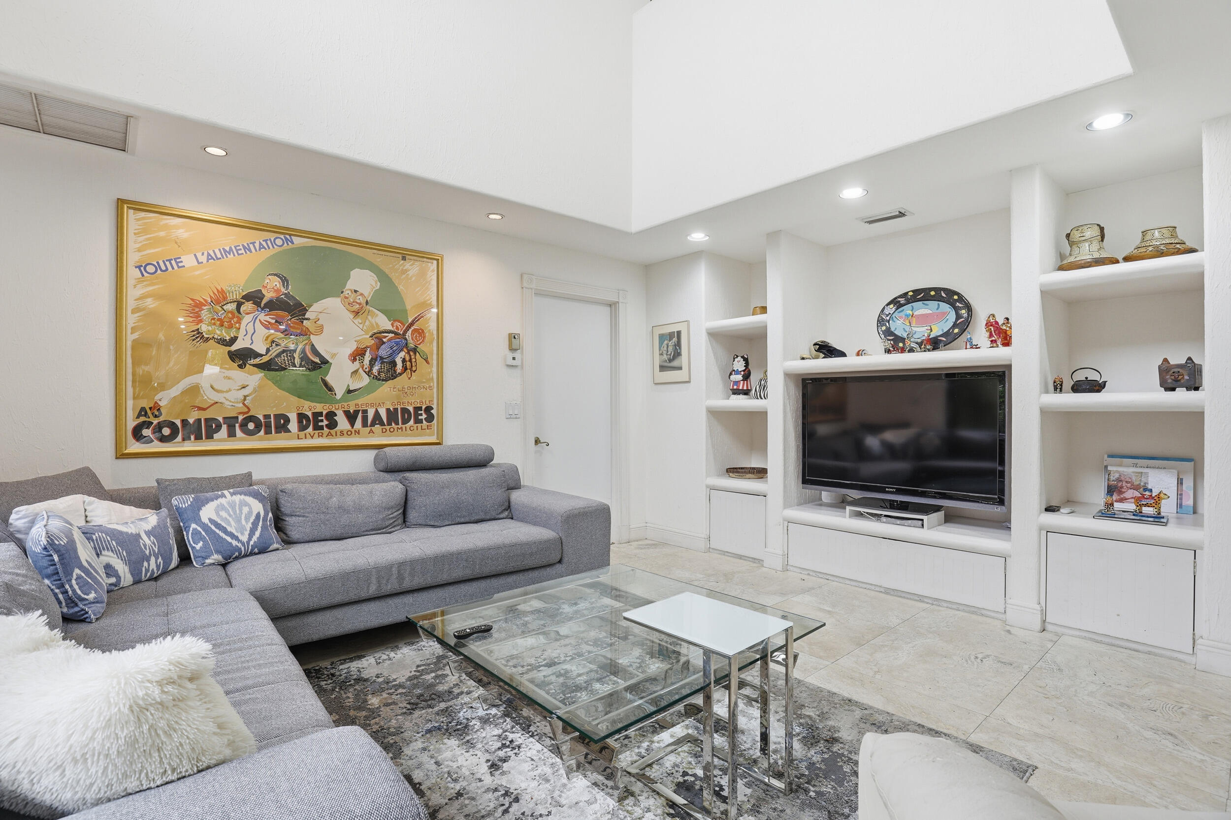 2248 Northwest 60th Street Boca Raton, FL 33496 - Photo 11 of 70 a living room with furniture and a flat screen tv