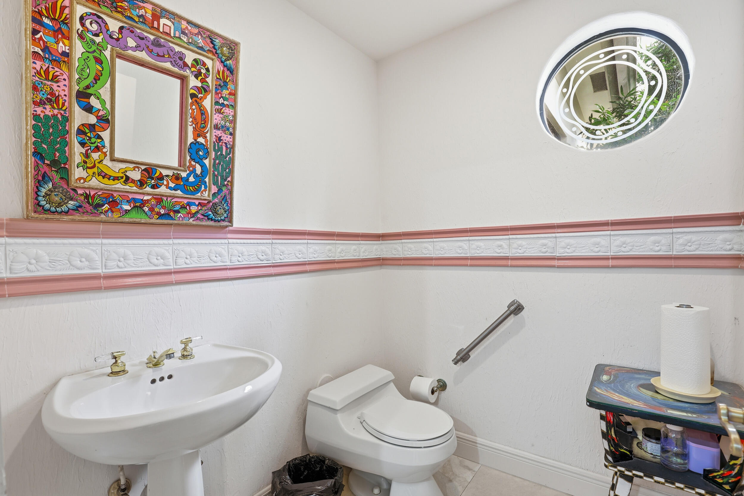 2248 Northwest 60th Street Boca Raton, FL 33496 - Photo 30 of 70 a bathroom with a toilet a sink and a mirror