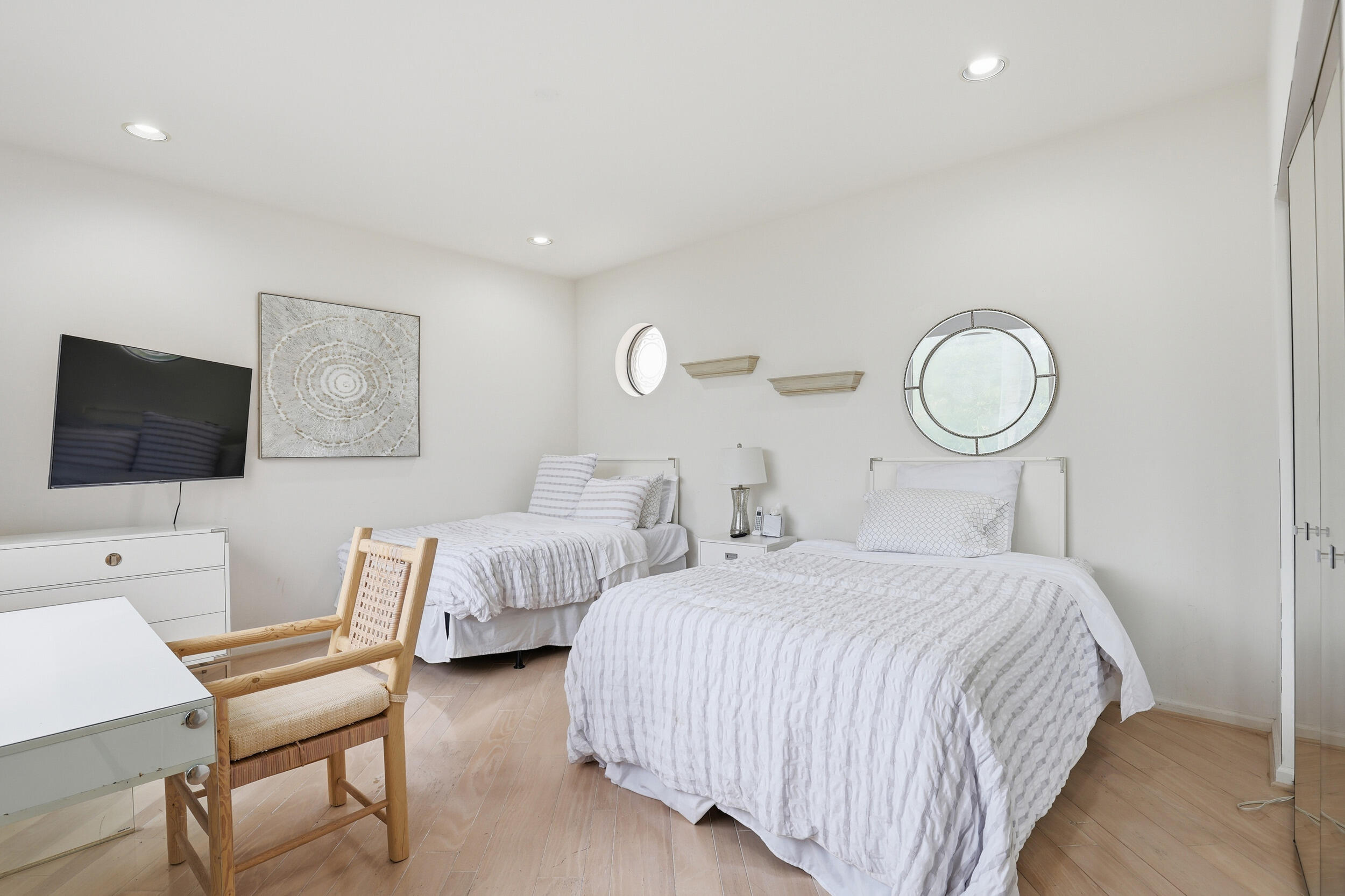 2248 Northwest 60th Street Boca Raton, FL 33496 - Photo 39 of 70 a bedroom with two beds and a television