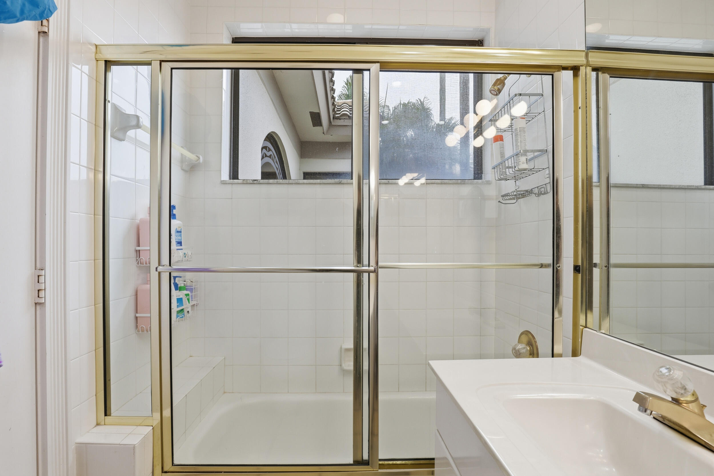 2248 Northwest 60th Street Boca Raton, FL 33496 - Photo 44 of 70 a bathroom with a bathtub and a sink