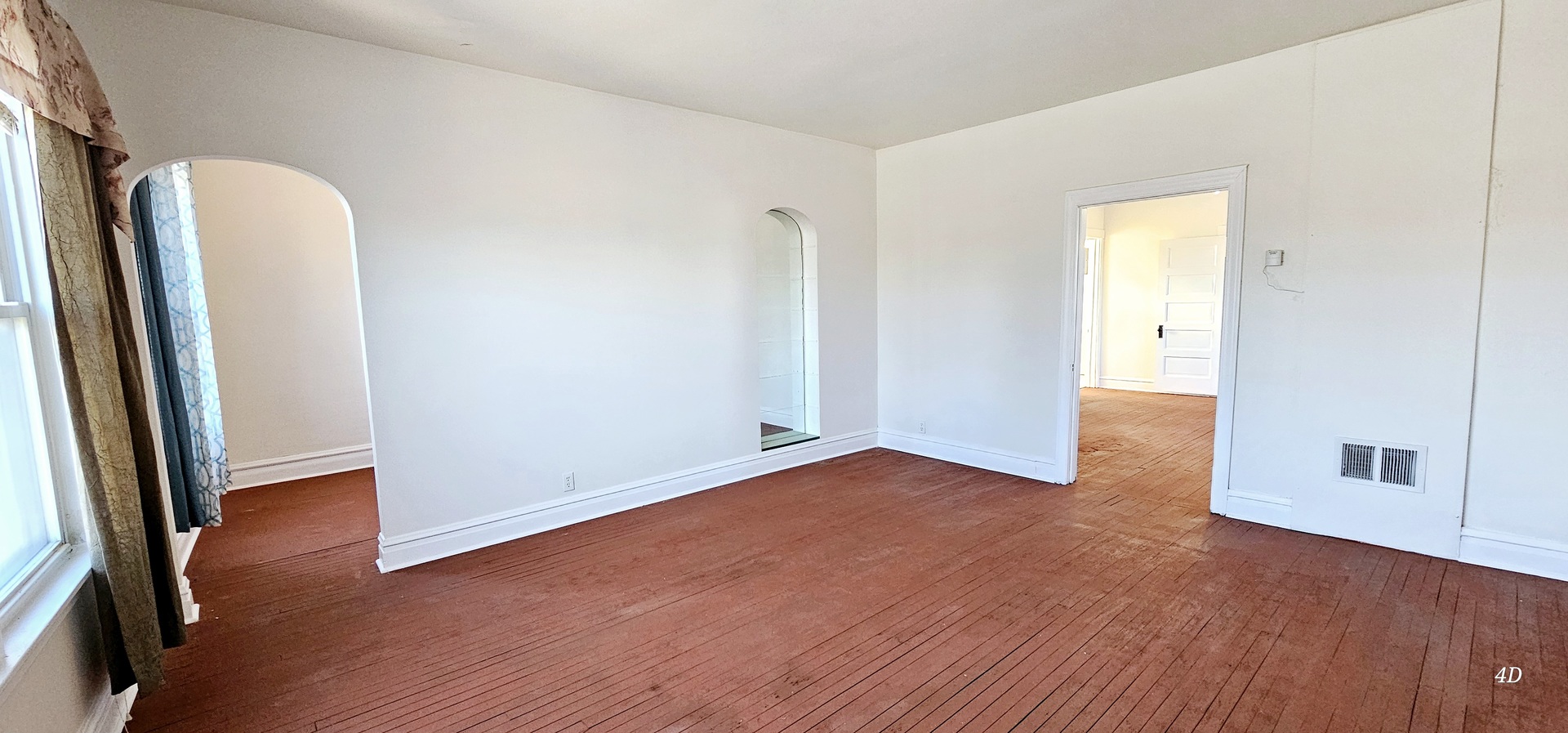 7400 Archer Road, Unit 7400 Justice, IL 60458 - Photo 28 of 76 an empty room with wooden floor and a mirror