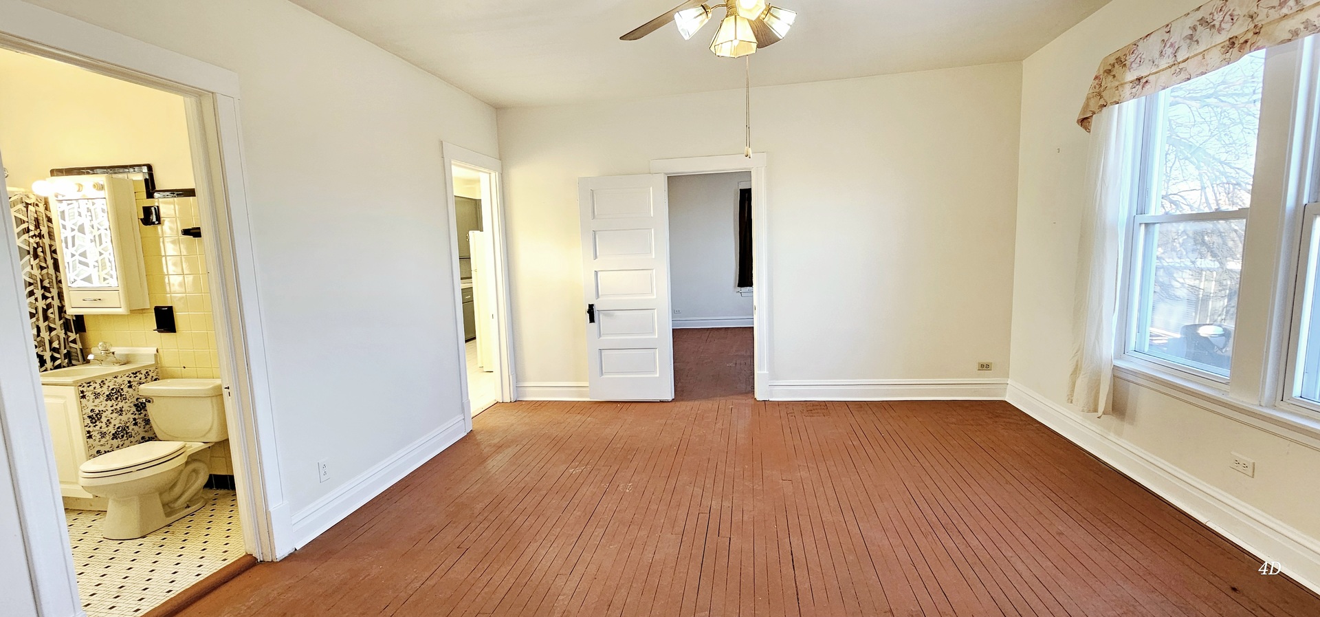 7400 Archer Road, Unit 7400 Justice, IL 60458 - Photo 30 of 76 a view of empty room with wooden floor and windows