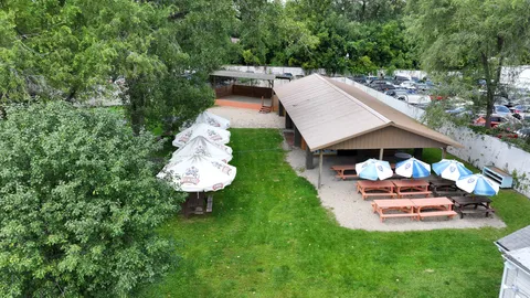 a view of yard with patio