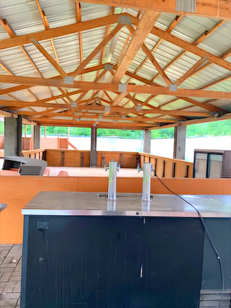 7400 Archer Road, Unit 7400 Justice, IL 60458 - Photo 52 of 76 a view of a patio with a table and chairs under an umbrella