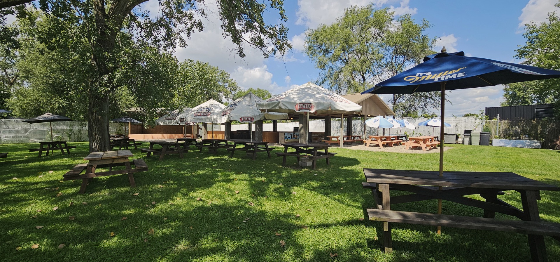 7400 Archer Road, Unit 7400 Justice, IL 60458 - Photo 69 of 76 a view of a table and chairs under an umbrella