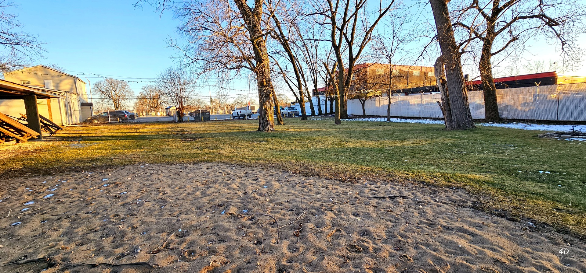 7400 Archer Road, Unit 7400 Justice, IL 60458 - Photo 74 of 76 a view of a yard with a house in the background