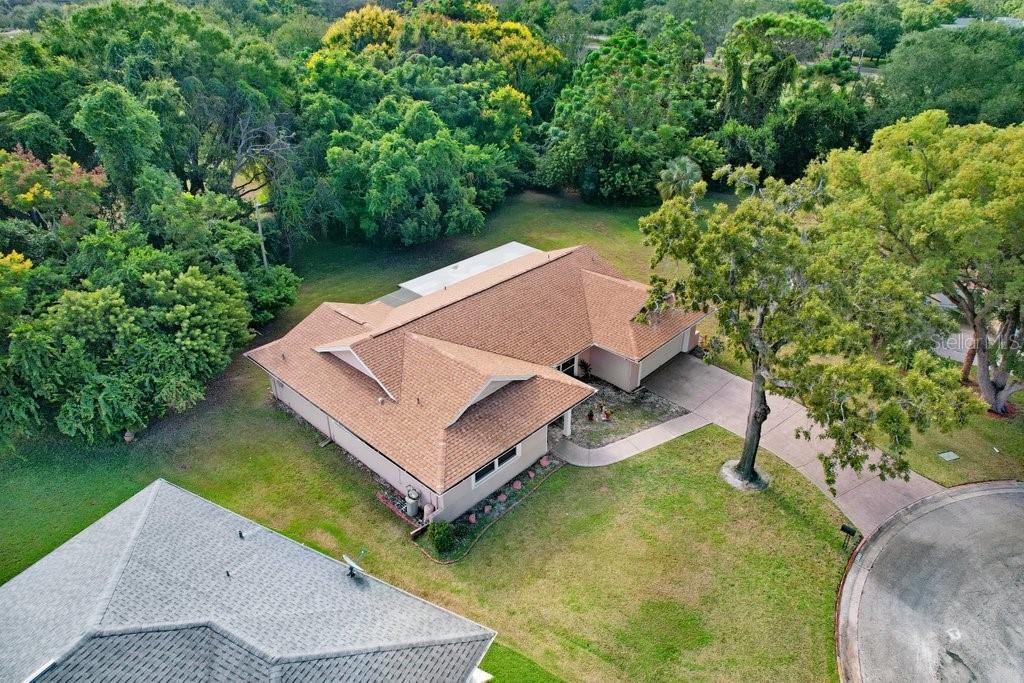 12600 Castleberry Court Bayonet Point, FL 34667 - Photo 11 of 52 an aerial view of a house with a yard