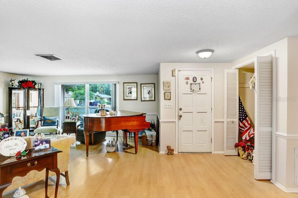 12600 Castleberry Court Bayonet Point, FL 34667 - Photo 20 of 52 a view of a livingroom with furniture and a window