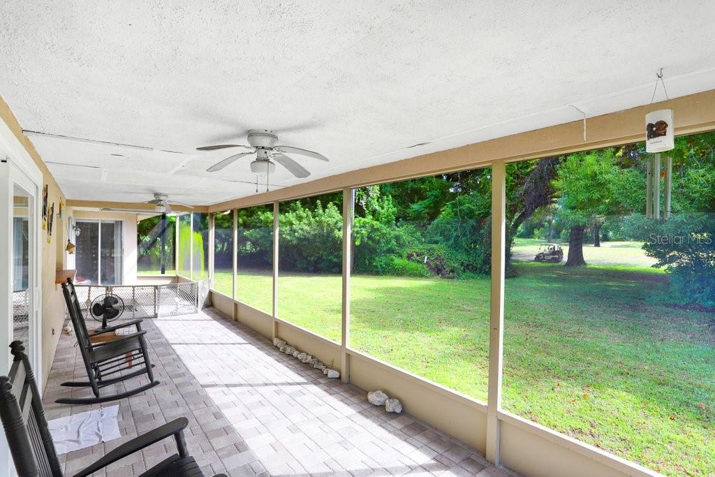 12600 Castleberry Court Bayonet Point, FL 34667 - Photo 40 of 52 a view of a patio with a backyard