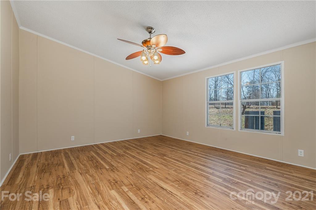 428 Elliott Rd Extension Rutherfordton, NC 28139 - Photo 14 of 41 a view of an empty room with a window