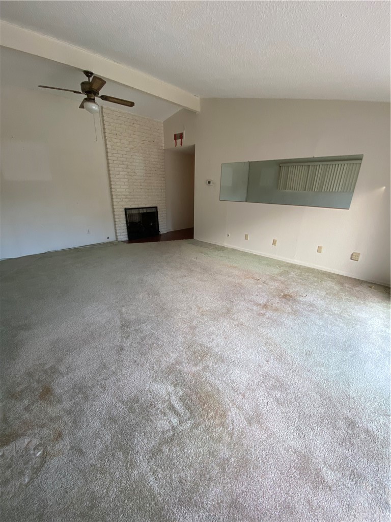 207 Hanover Drive Costa Mesa, CA 92626 - Photo 5 of 7 a view of a room with a ceiling fan