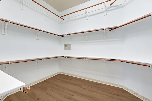 a view of an empty walk in closet