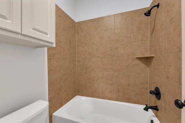 a bathroom with a bathtub