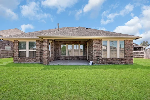 a view of a house with a garden