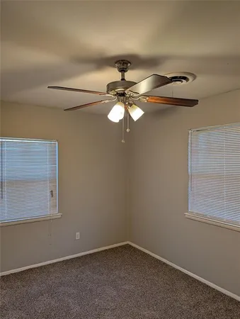 a view of a small space with a fan