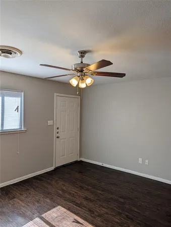 a view of a livingroom with wooden floor