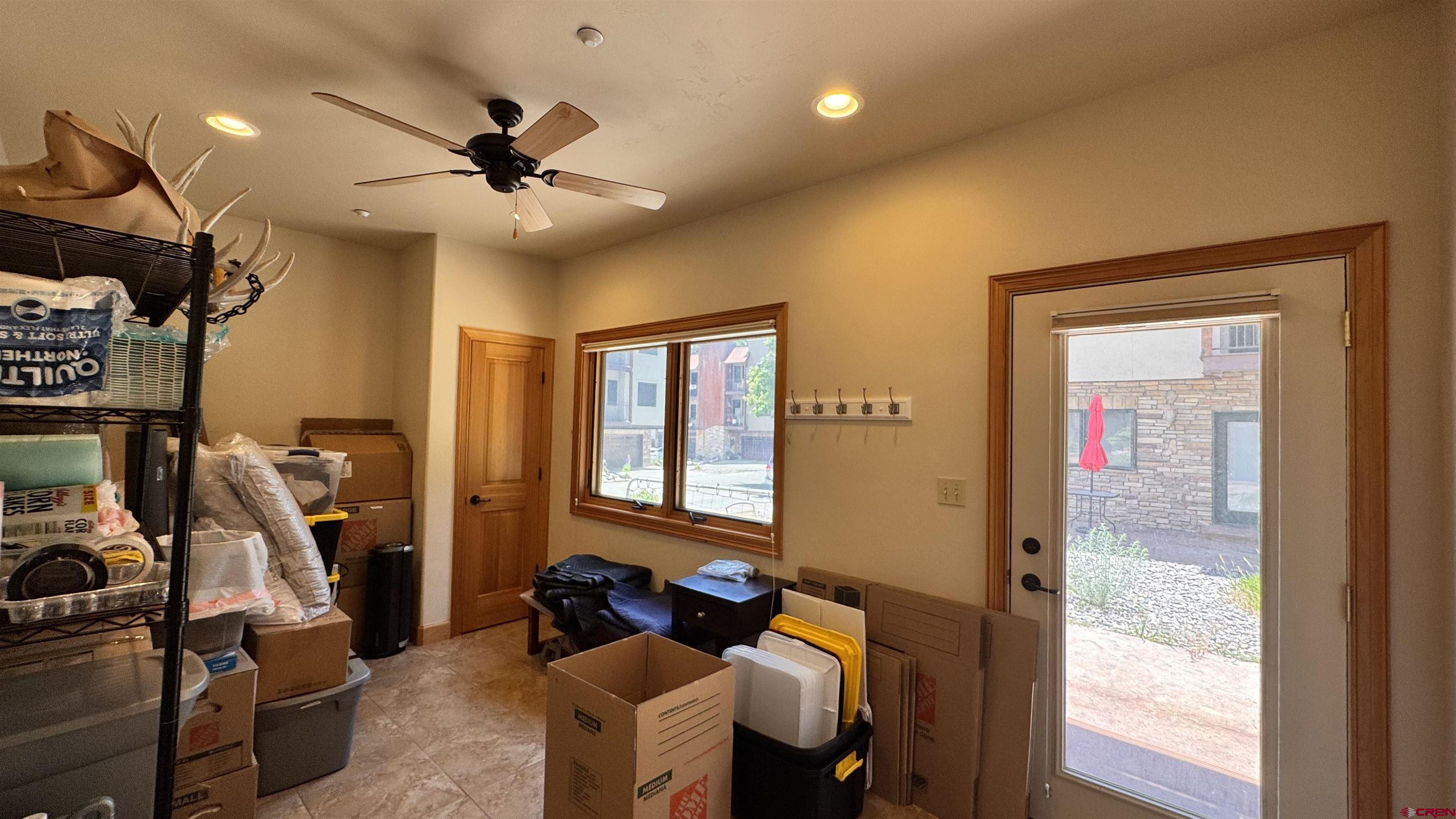 1422 Animas View Drive, Unit 55 Durango, CO 81301 - Photo 37 of 45 a living room with furniture and a window