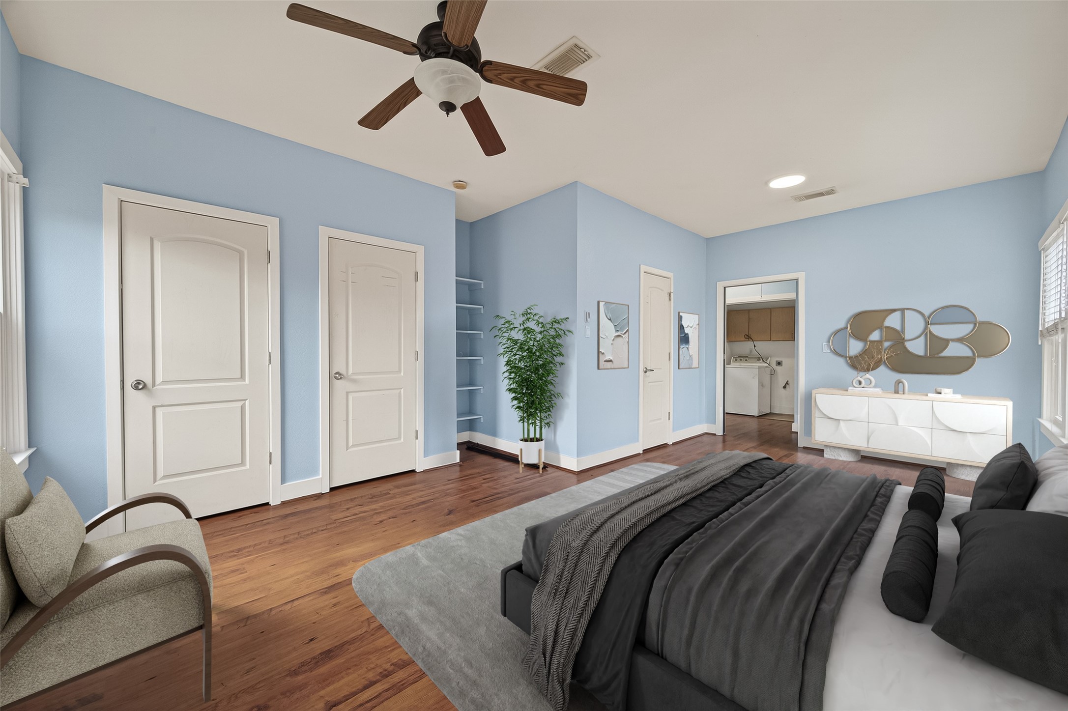 1620 Andrews Street Houston, TX 77019 - Photo 12 of 12 a bedroom with a bed and wooden floor