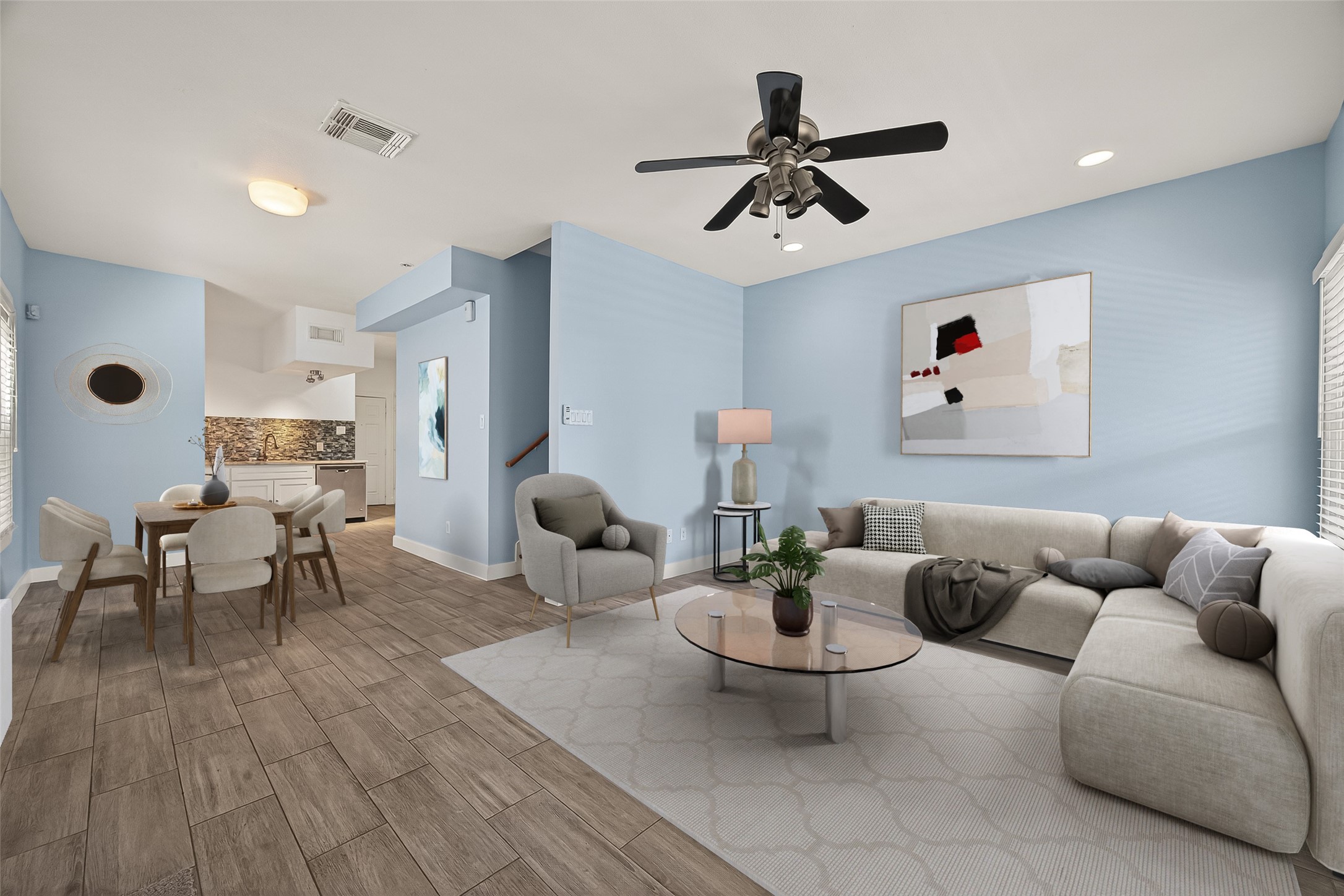1620 Andrews Street Houston, TX 77019 - Photo 3 of 12 a living room with furniture and a wooden floor