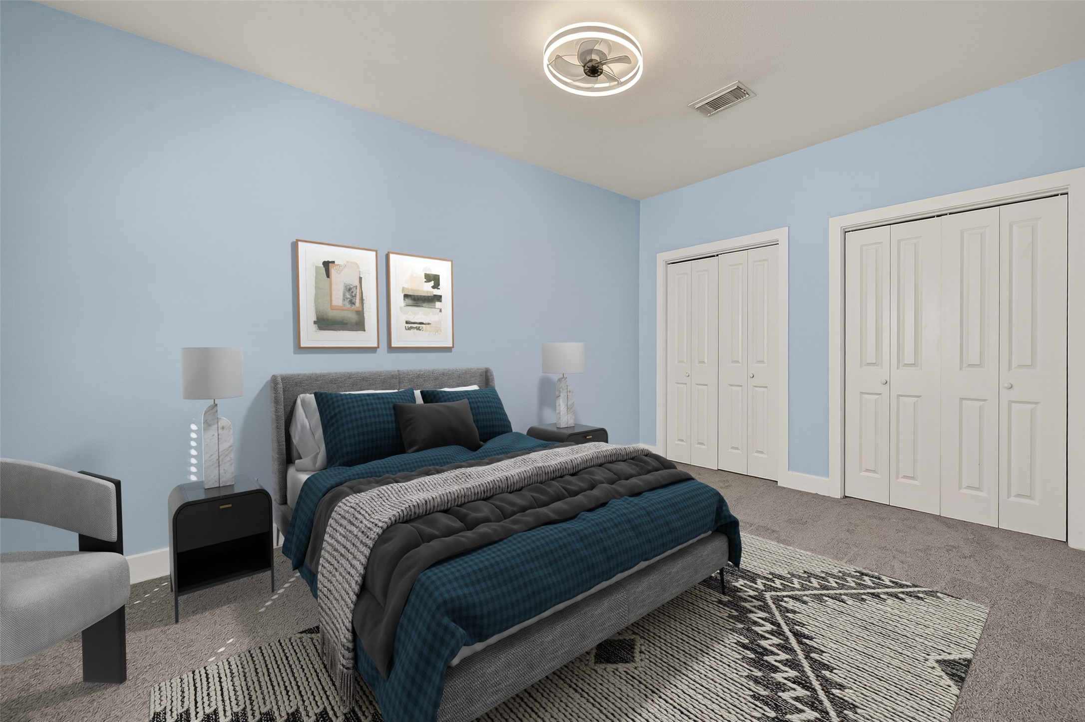 1620 Andrews Street Houston, TX 77019 - Photo 10 of 12 a bedroom with a bed and a couch