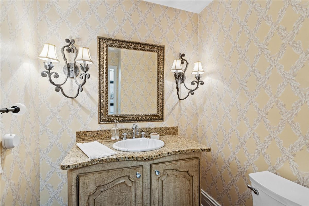 2250 Lisson Road Naperville, IL 60565 - Photo 11 of 53 a bathroom with a granite countertop sink and a mirror