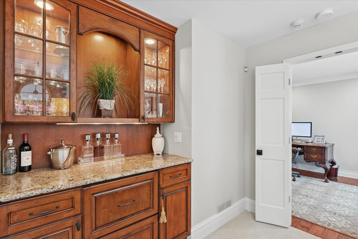 2250 Lisson Road Naperville, IL 60565 - Photo 19 of 53 a kitchen with granite countertop a sink and a window