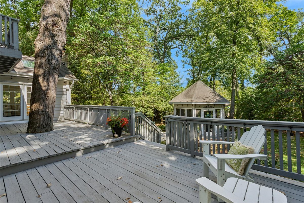 2250 Lisson Road Naperville, IL 60565 - Photo 45 of 53 a view of a deck with two chair and wooden floor