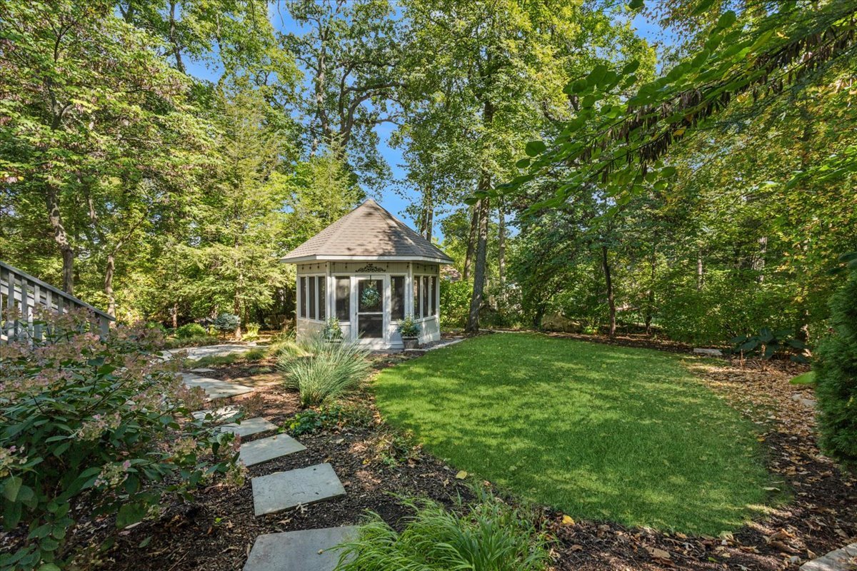2250 Lisson Road Naperville, IL 60565 - Photo 46 of 53 a front view of a house with garden
