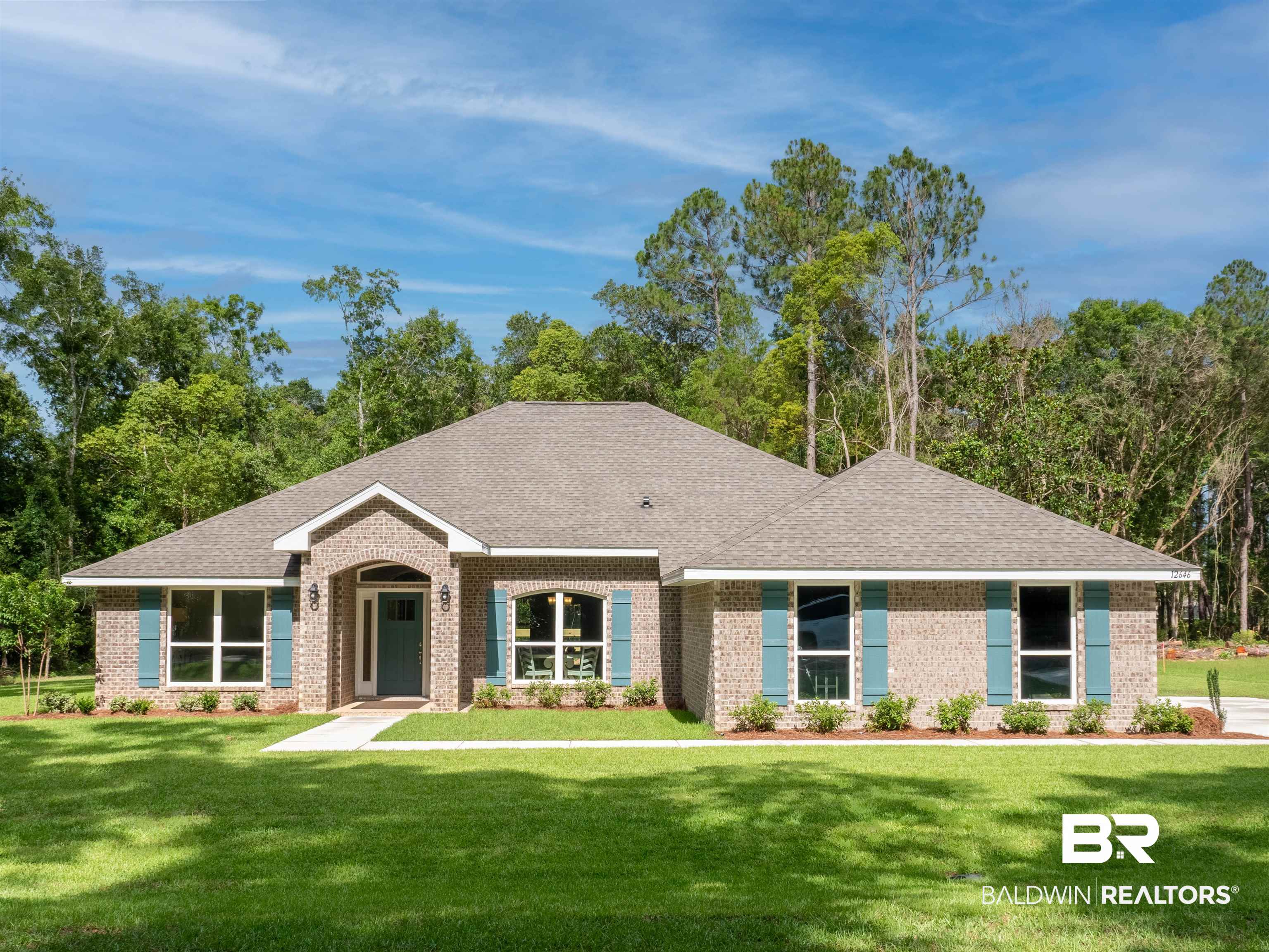 12646 Michigan Avenue Elberta, AL 36530 - Photo 1 of 47 View of front of property featuring a front yard, brick siding, and roof with shingles