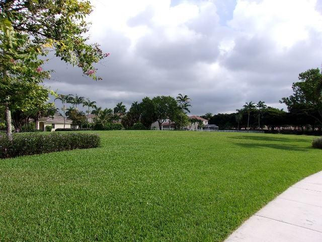 1564 Sunset Way Weston, FL 33327 - Photo 21 of 40 a view of building with outdoor space