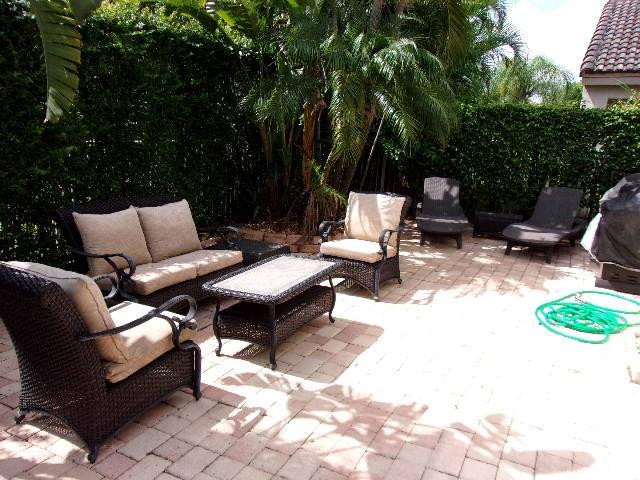 1564 Sunset Way Weston, FL 33327 - Photo 3 of 40 a outdoor living space with furniture and a couch